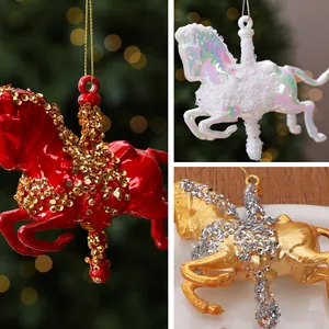 Details of sequined carousel horse Christmas tree ornaments in red, white, and gold