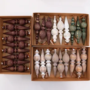 Collection of assorted vintage tapered Christmas ornaments in rustic cardboard gift boxes
