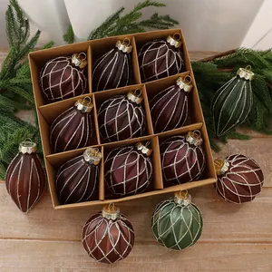 Detailed view of 9pcs PET painted Christmas baubles in rustic cardboard gift box.