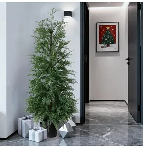 Artificial arborvitae Christmas tree displayed in a modern minimalist indoor setting