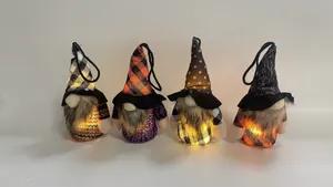 Detailed view of four glowing Halloween gnomes with unique festive patterned hats
