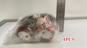 Detail view of 4pcs glowing Halloween gnomes in plastic packaging with measurement ruler