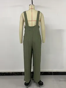 Back view of olive green textured jumpsuit showing wide straps and loose wide-leg cut