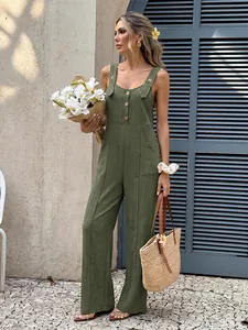 Summer olive green textured backless jumpsuit with elegant button details and pockets