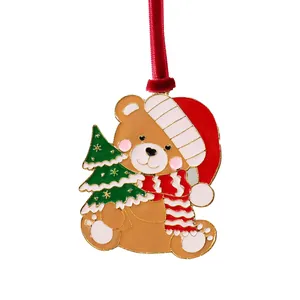 Festive enamel teddy bear Christmas tree ornament with red velvet hanging ribbon