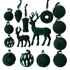 Set of dark green flocked Christmas ornaments including reindeer and various textured balls