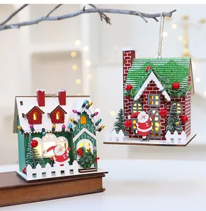 Festive lighted wooden Christmas house ornaments with Santa Claus and tree details