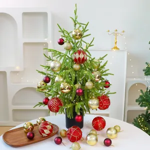 High-quality PE desktop Christmas tree set with elegant red and gold decorative ornaments