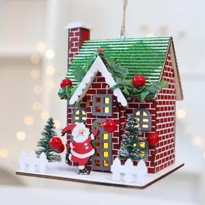 Handcrafted wooden Christmas house ornament with warm LED light and Santa Claus figure