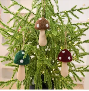 Detail of wool felt mushroom Christmas tree ornaments with wooden stems