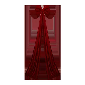 Large elegant burgundy velvet Christmas bow pendant for festive tree and home decoration.