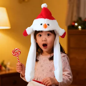 Close-up detail of a cute child wearing a plush moving airbag snowman Christmas hat