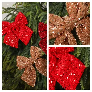 Set of red and gold sequined Christmas bow tree ornaments shown with close-up details