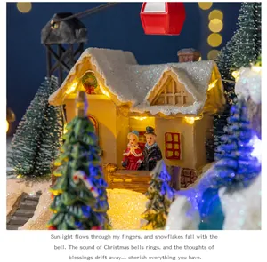 Detailed close-up of a glowing Christmas music box scene featuring a miniature house and figures