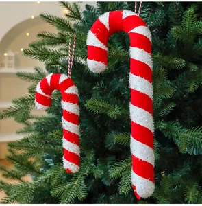 Detailed view of red and white striped Christmas candy cane foam ornaments
