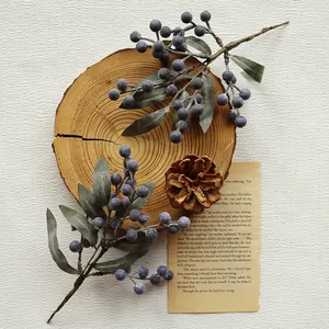 Realistic artificial blueberry branches for Christmas tree and wreath decoration.