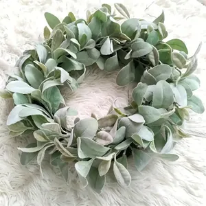 Detailed view of artificial lamb's ear wreath featuring soft green leaves for home decor