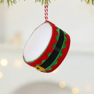 Handmade felt drum Christmas tree ornament in festive red and green Grinch theme colors