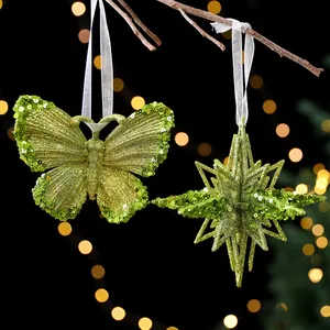 Glitzernde grüne Pailletten Schmetterling und Stern Ornamente für den Weihnachtsbaum