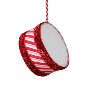 Festive red and white striped drum Christmas tree ornament with glitter edges