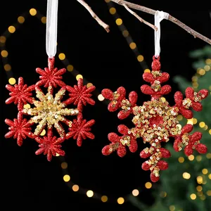 Pair of red and gold sequined glitter snowflake ornaments for Christmas tree decor