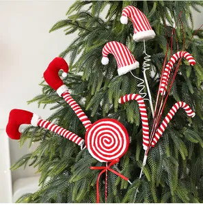 Festive red and white striped Christmas tree picks with elf legs and candy canes