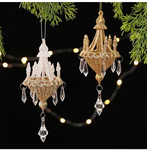 Detail view of crystal chandelier Christmas tree ornaments with warm bokeh lights