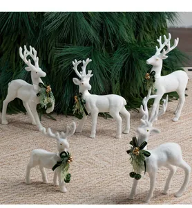 Gruppo di ornamenti a forma di renna bianca floccata con fiocchi di velluto verde