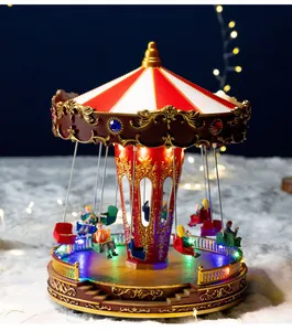 Prachtige verlichte roterende kerstcarrousel muziekdoos met feestelijke beeldjes