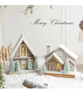Detailed view of Nordic wooden Christmas houses with snowy roofs and warm interior lighting