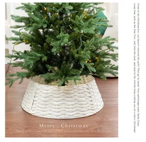 Close-up detail of the white woven wicker Christmas tree collar base