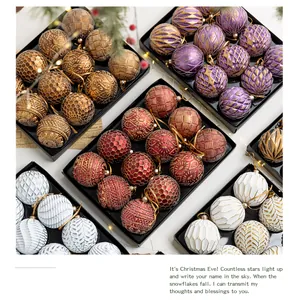Assorted 8cm Christmas ball ornaments with various patterns in black display boxes