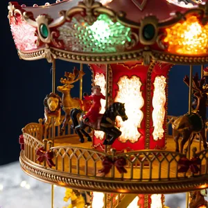 Prachtige kerstcarrousel muziekdoos met warme lichten en draaiende kerstfiguren