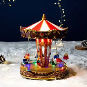 Muzikale kerstcarrousel met draaiende zweefmolen en LED-verlichting voor tafeldecoratie.