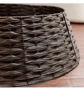 Close-up of hand-woven dark brown Christmas tree collar with elegant textured pattern