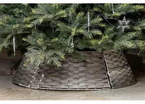 Vue détaillée de la texture tressée à la main du cache-pied de sapin de Noël gris