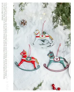 Vintage iron rocking horse Christmas ornaments in white, red and teal colors