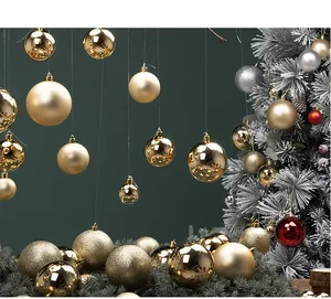 Elegant gold and champagne Christmas ball ornaments in matte and shiny finishes