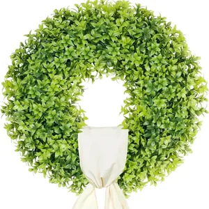 Spring and summer artificial green boxwood wreath for front door with cream silk ribbon