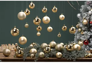 24-piece set of gold Christmas ball ornaments in matte, shiny, and glitter finishes