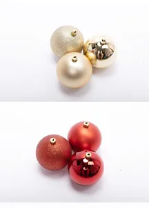 Close-up of gold and red Christmas ornaments in glitter, matte, and glossy finishes