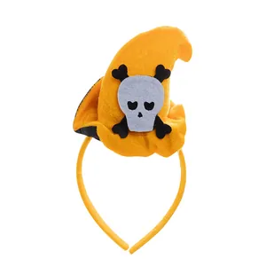 Halloween headband featuring a plush orange witch hat with a felt skull applique