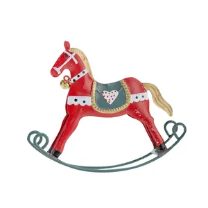 Vintage red metal rocking horse Christmas ornament with gold mane and heart saddle