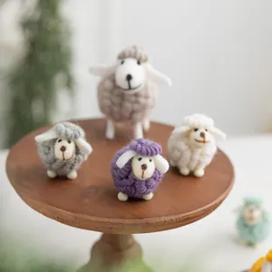 Handmade wool felt sheep figurines for Christmas desktop decoration in multiple colors