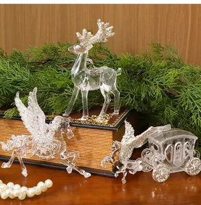Detailed shot of transparent acrylic reindeer and Pegasus ornaments for Christmas decor