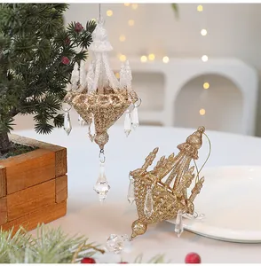 Detailed view of elegant gold glitter chandelier Christmas ornaments with crystal drops