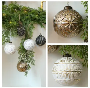 Detailed view of 8cm vintage Christmas balls with intricate embossed patterns and gold accents