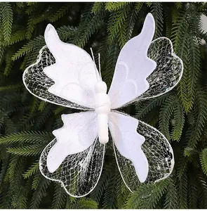 Detailed view of white sequin cloth butterfly ornament for Christmas tree decor.