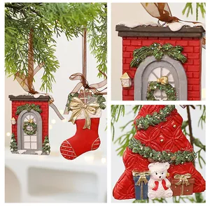 Detailed view of vintage 3D resin Christmas tree hanging ornaments with bear and stocking