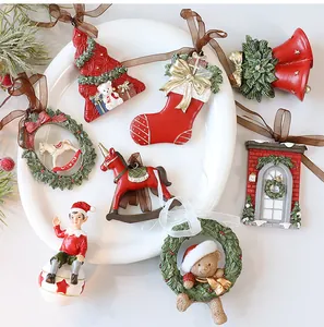 Detailed view of various retro 3D resin Christmas tree ornaments on a white plate